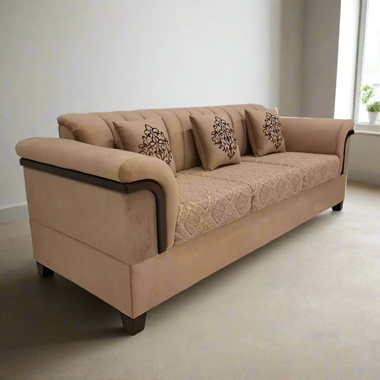 Beige sofa with decorative pillows on a marble floor, branded as Lahore Furniture.